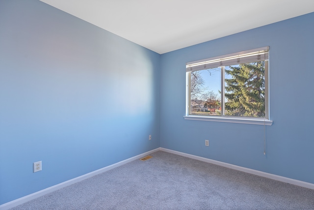 view of carpeted spare room