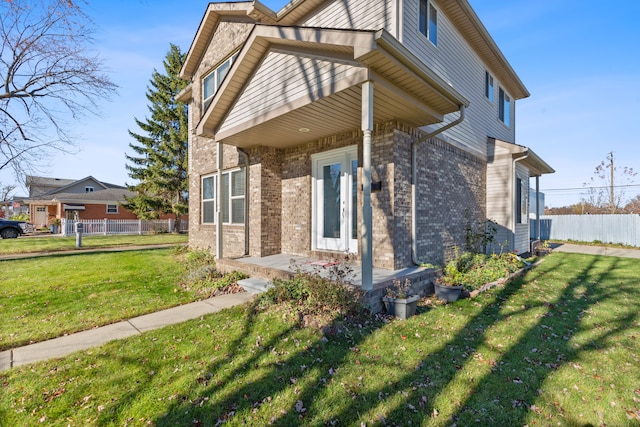 view of home's exterior featuring a lawn