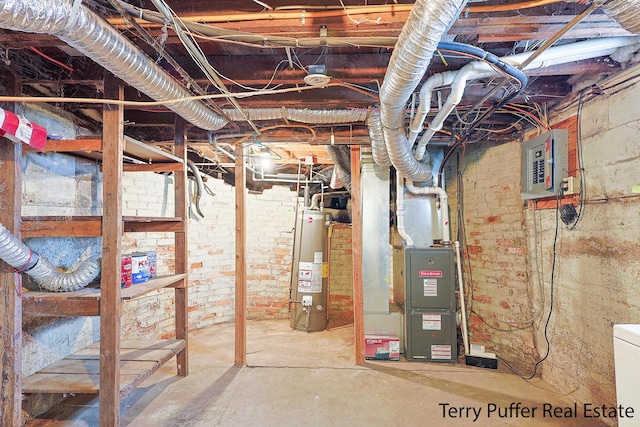 basement with electric panel, water heater, and heating unit