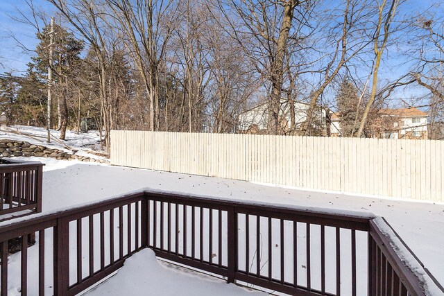 view of snow covered deck