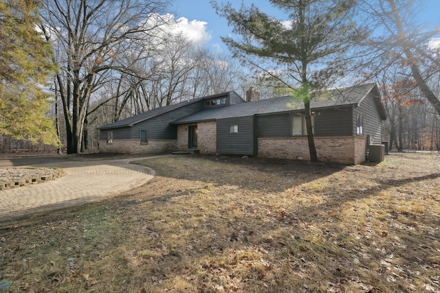 view of property exterior featuring central AC unit