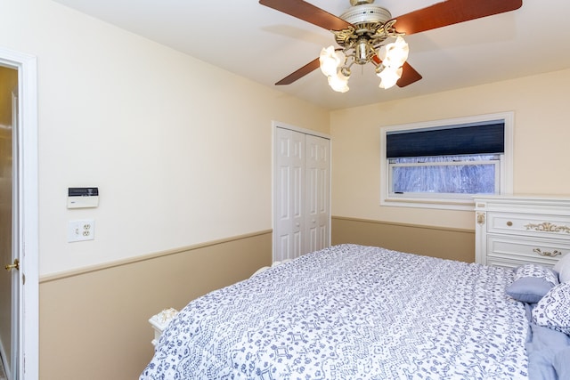 bedroom featuring a closet and ceiling fan