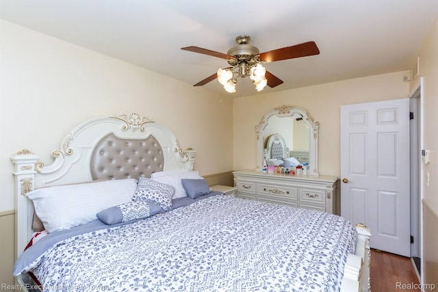 8268 Doncaster Dr, Sterling Heights, MI 48312 - bedroom with dark wood finished floors and a ceiling fan