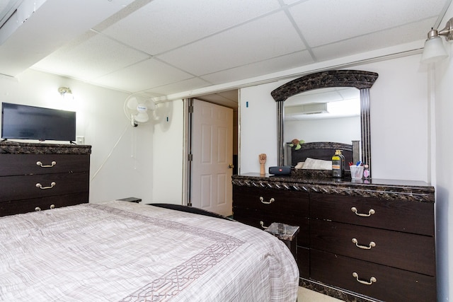 bedroom with a drop ceiling