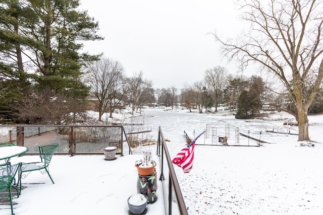 view of yard layered in snow