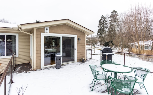 view of snow covered deck