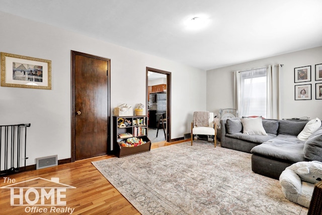 living room featuring light wood-type flooring