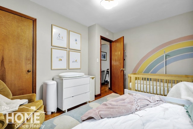 bedroom featuring hardwood / wood-style flooring