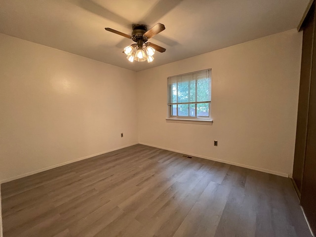 unfurnished room featuring wood-type flooring and ceiling fan