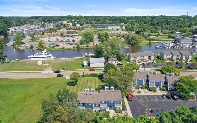 birds eye view of property featuring a water view