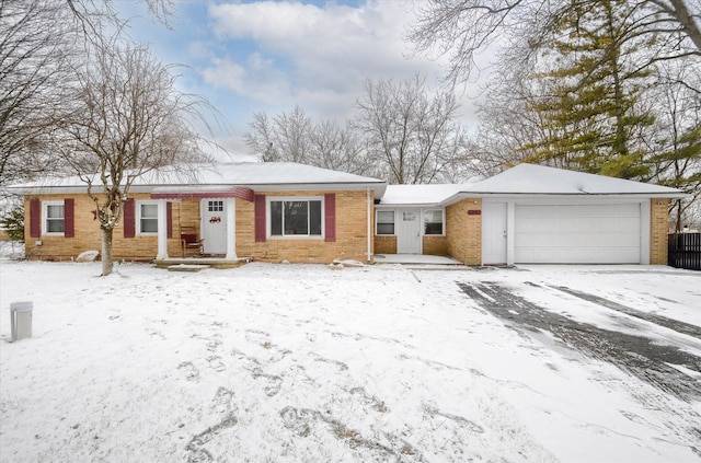 single story home featuring a garage