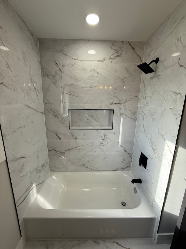 bathroom featuring bathtub / shower combination and recessed lighting