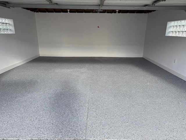 garage with baseboards