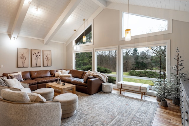 living room featuring beamed ceiling, wooden ceiling, high vaulted ceiling, and light wood-type flooring