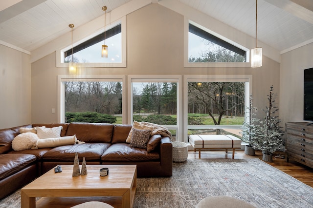 living room featuring beamed ceiling, wood-type flooring, high vaulted ceiling, and wooden ceiling