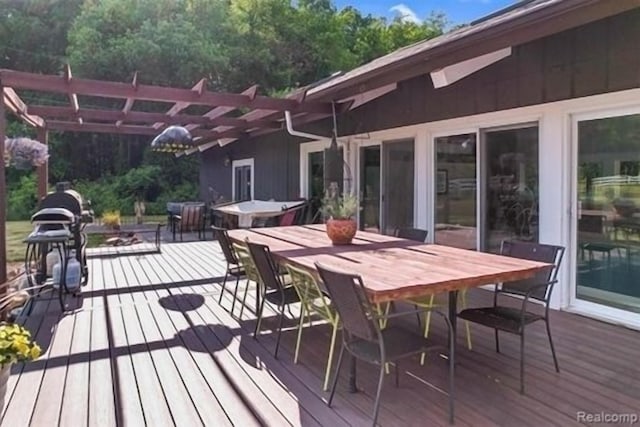 wooden deck with a pergola