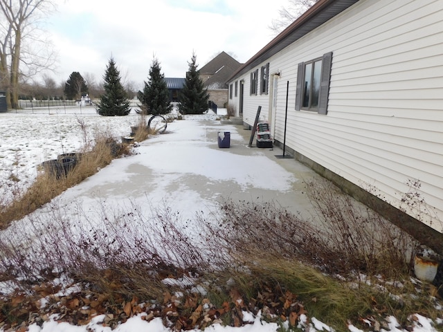 view of yard covered in snow