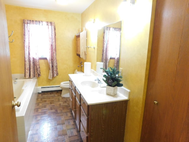 bathroom featuring a bathing tub, parquet floors, a baseboard heating unit, toilet, and vanity