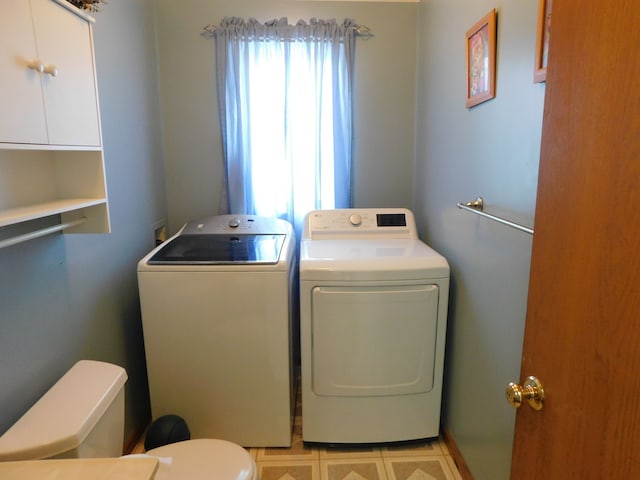 laundry area featuring independent washer and dryer