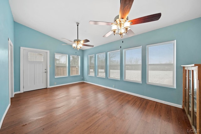 interior space featuring ceiling fan and lofted ceiling