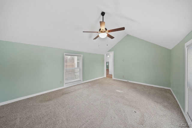 additional living space featuring ceiling fan, lofted ceiling, and carpet floors