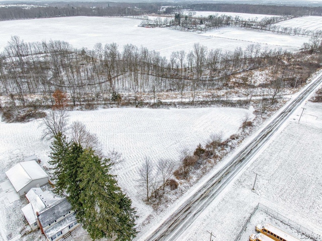 snowy aerial view with a rural view