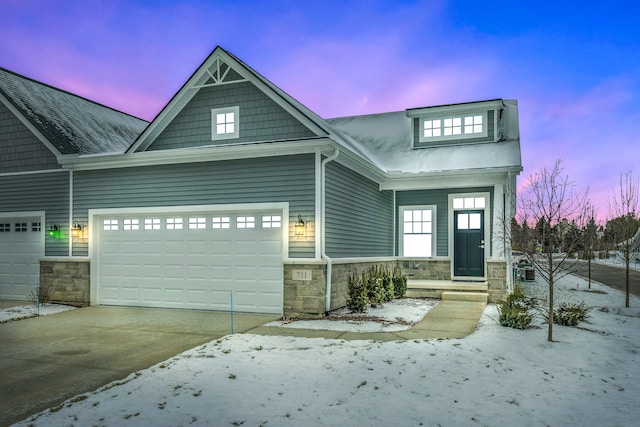 craftsman-style home with a garage