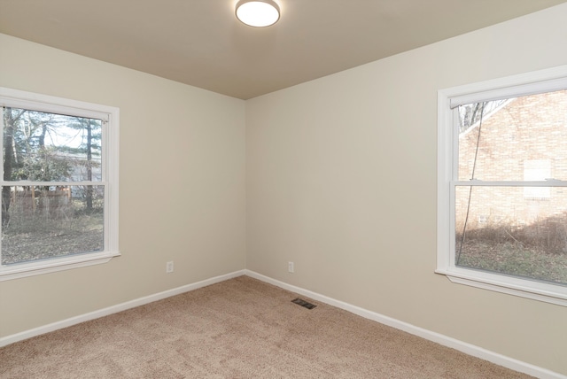 view of carpeted spare room