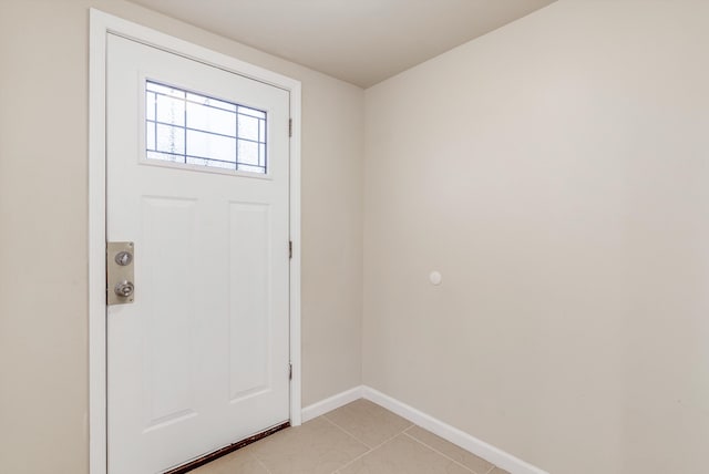 entrance foyer featuring light tile patterned floors