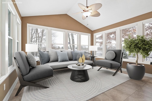 sunroom / solarium with ceiling fan and vaulted ceiling