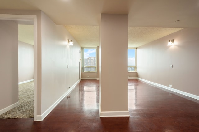 hall with dark hardwood / wood-style floors