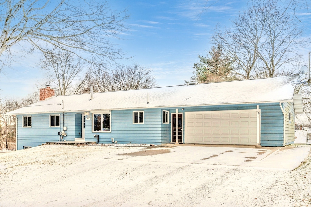 ranch-style house with a garage