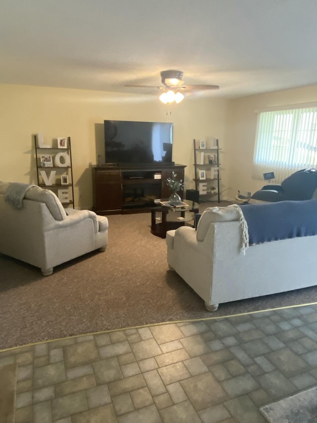 living room featuring ceiling fan