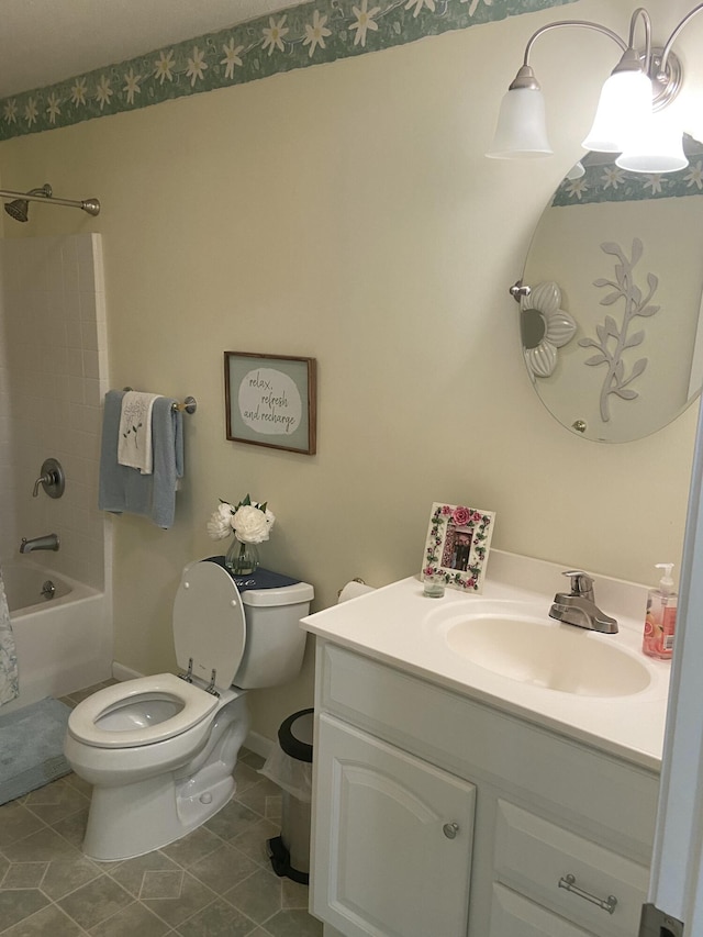 full bathroom featuring tile patterned flooring, vanity,  shower combination, and toilet