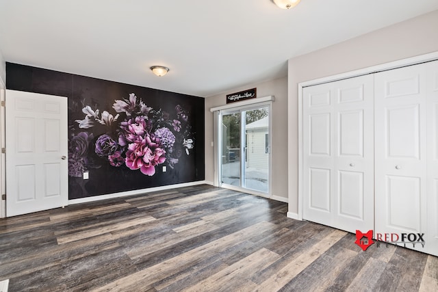 entrance foyer featuring dark hardwood / wood-style floors