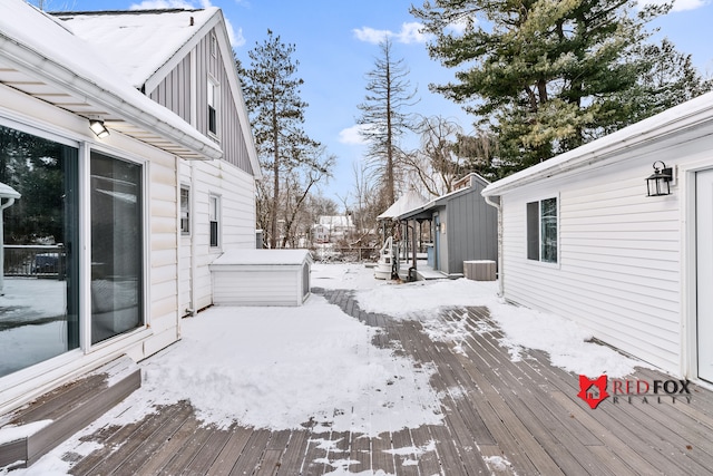 view of snow covered deck