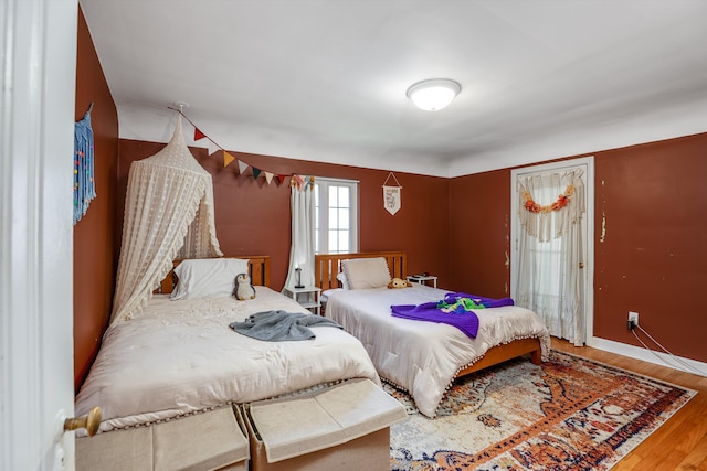 bedroom featuring hardwood / wood-style floors