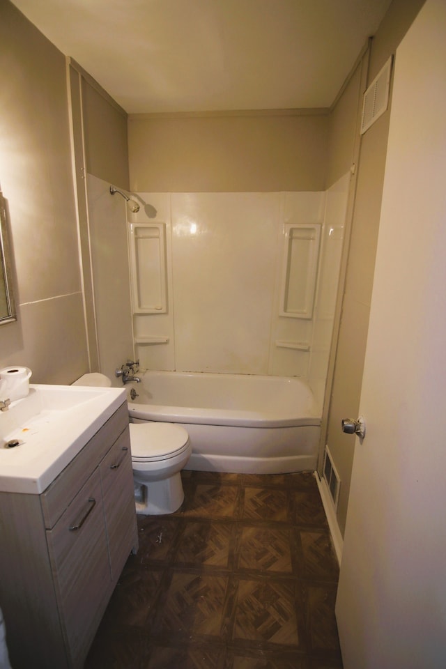 full bathroom with vanity, toilet, and shower / washtub combination