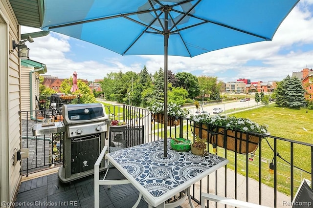 balcony featuring area for grilling