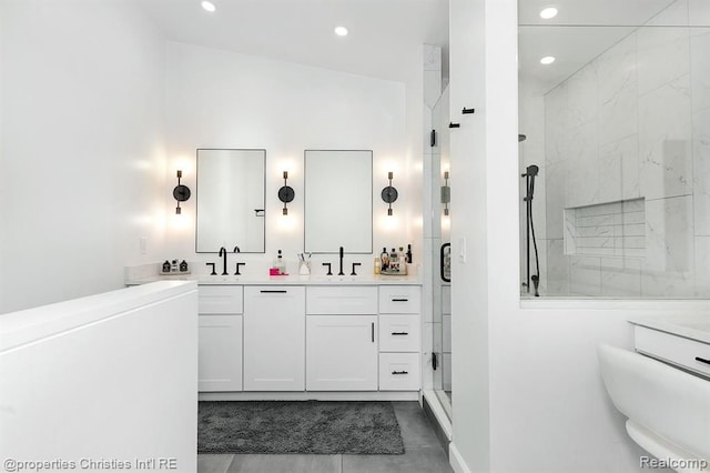 bathroom featuring vanity and walk in shower