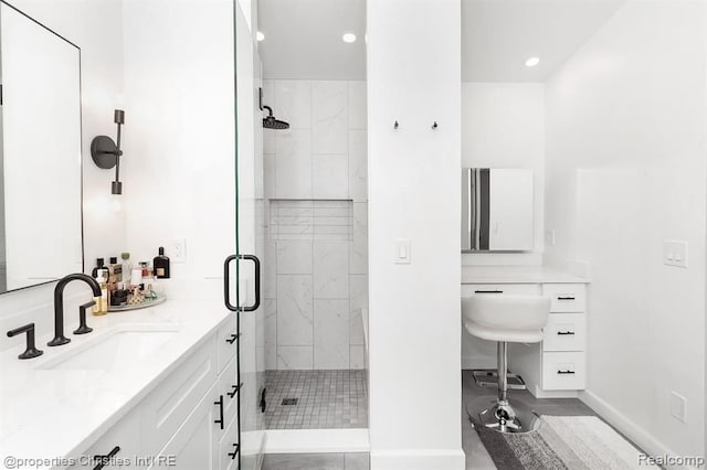 bathroom with vanity and walk in shower