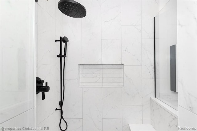 details featuring a tile shower