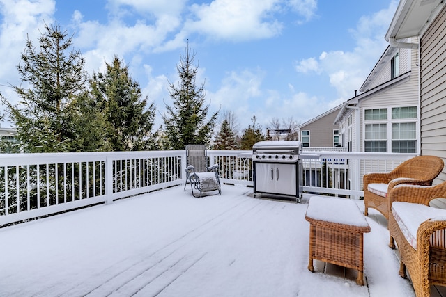 view of snow covered deck