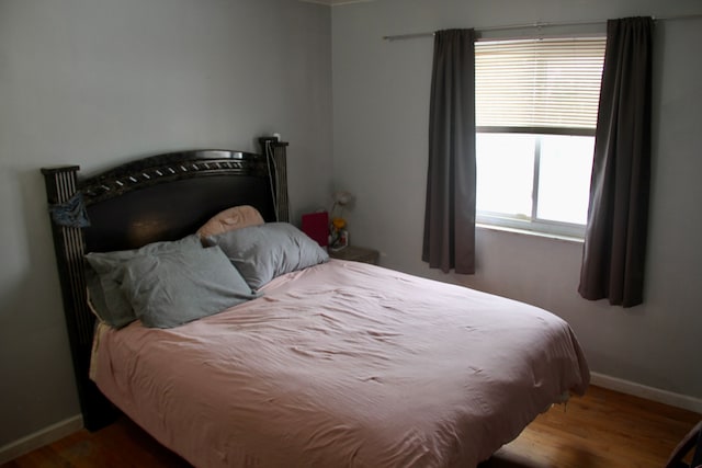 bedroom featuring hardwood / wood-style floors