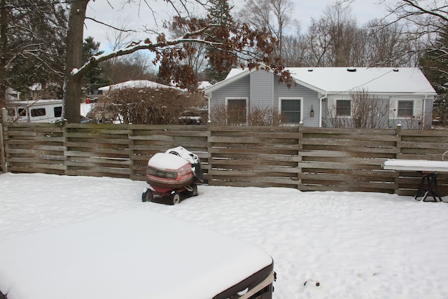 view of yard covered in snow