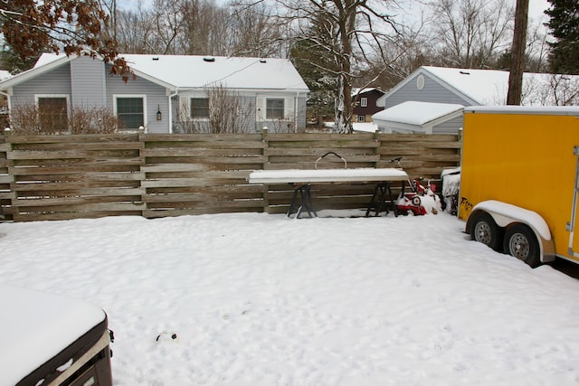 view of yard covered in snow