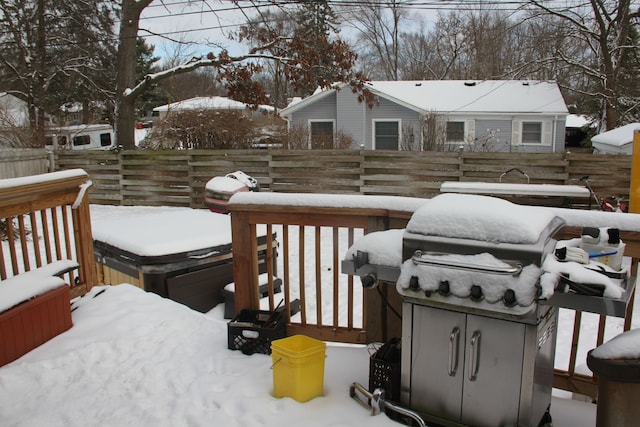 view of snow covered deck