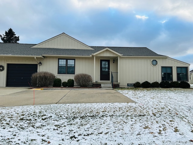 single story home with a garage