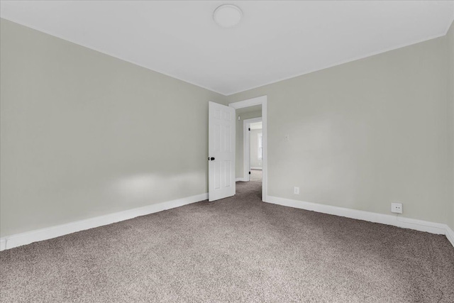 unfurnished room with carpet