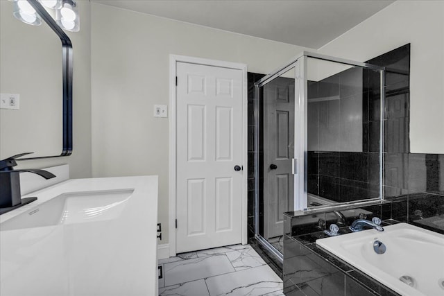 bathroom with shower with separate bathtub and vanity